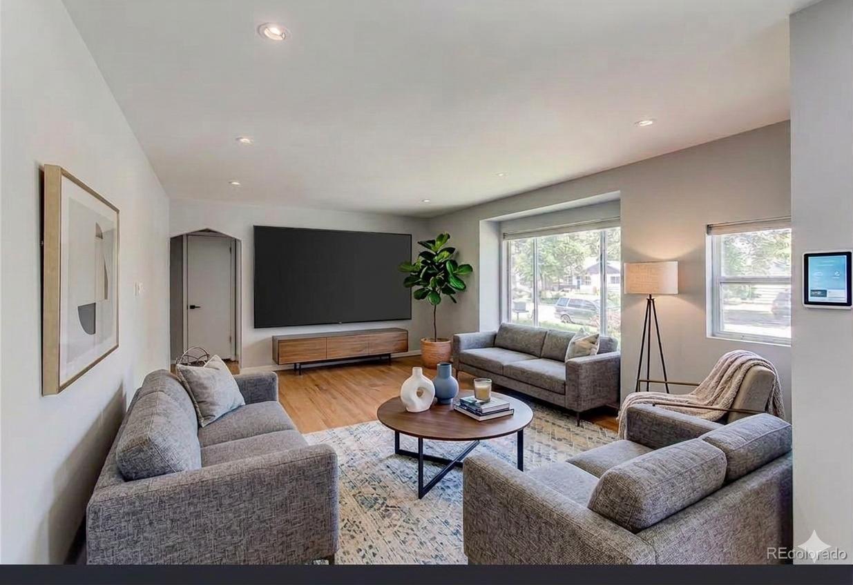 Bright, freshly finished living room with clean drywall and paint by Carlos Drywall & Paint